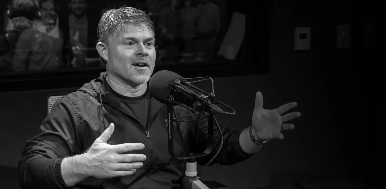 Jon Hicks behind microphone